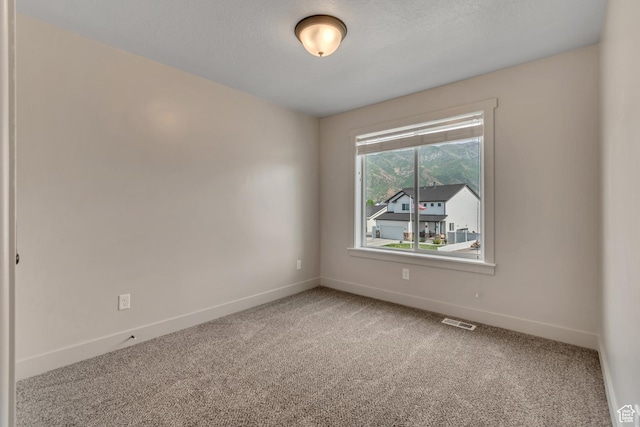 182 W Braeburn Ln, Santaquin, UT 84655 - carpeted empty room featuring baseboards