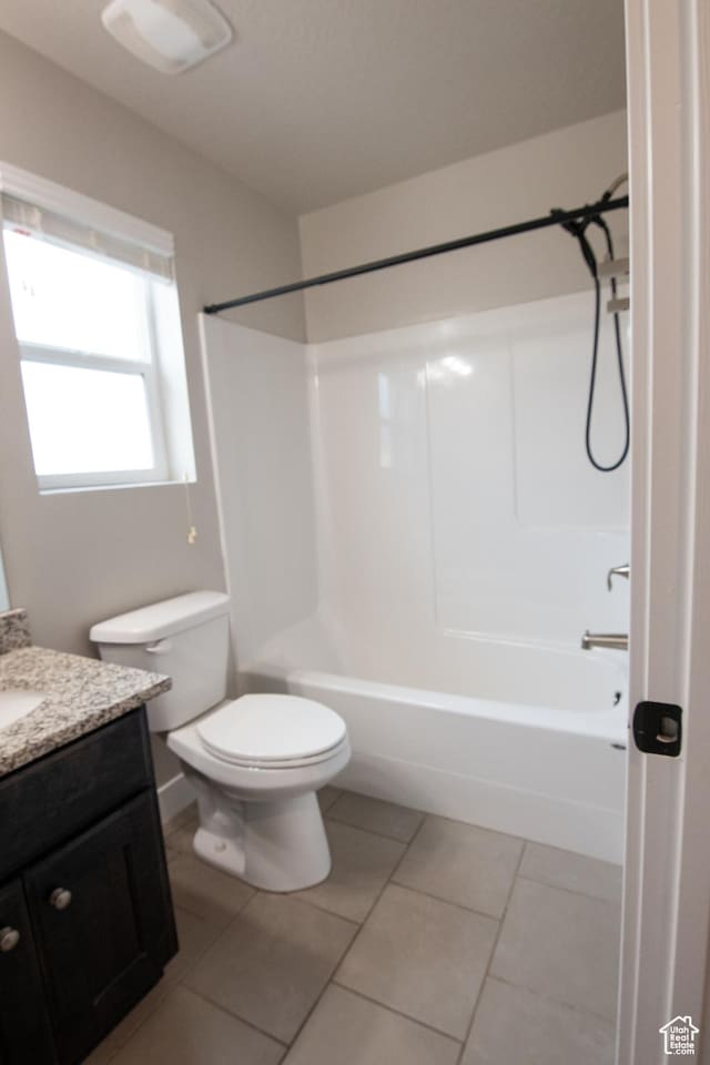 182 W Braeburn Ln, Santaquin, UT 84655 - full bathroom with vanity, tile patterned flooring, toilet, and washtub / shower combination