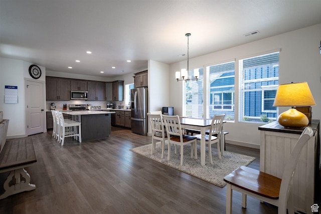 3795 S 4250 W Unit 446D, West Haven, UT 84401 - dining room featuring recessed lighting, a chandelier, dark wood-type flooring, and baseboards