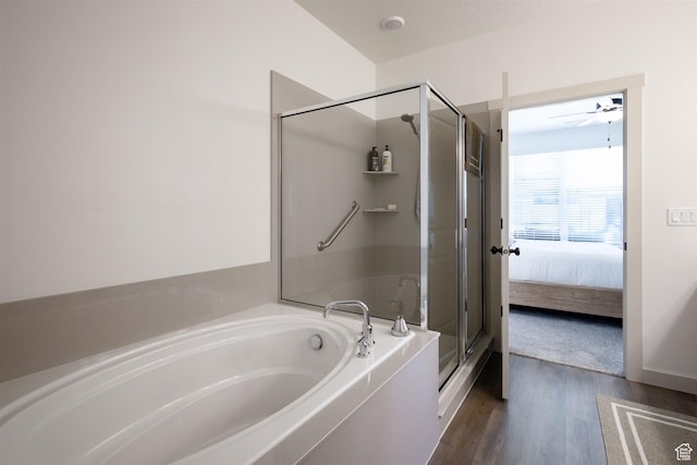 3795 S 4250 W Unit 446D, West Haven, UT 84401 - ensuite bathroom with a garden tub, a shower stall, and wood finished floors
