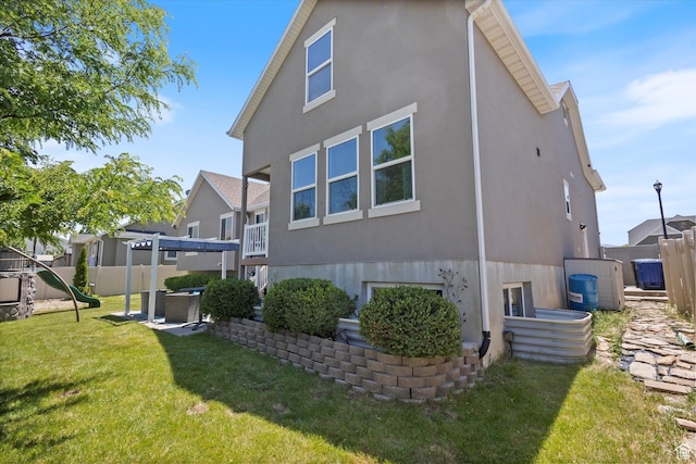 2127 Rio Grande Dr, Spanish Fork, UT 84660 - rear view of property with stucco siding