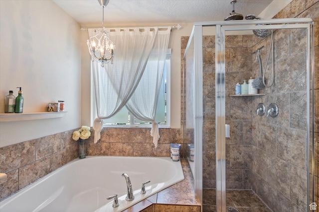 2127 Rio Grande Dr, Spanish Fork, UT 84660 - full bath with a bath, a stall shower, and a chandelier