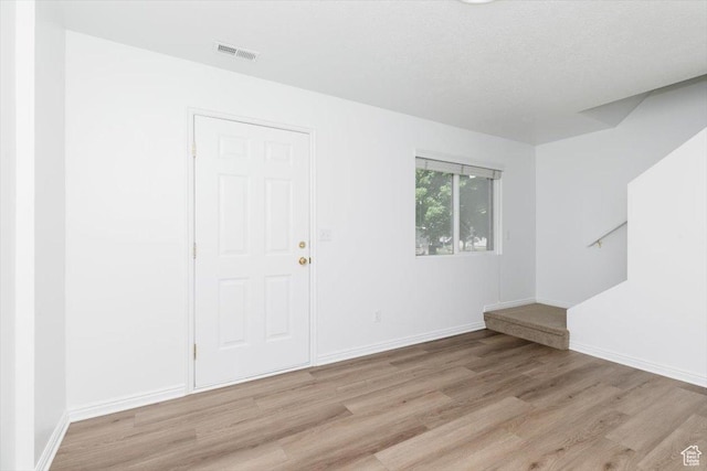 356 S 400 W, Logan, UT 84321 - empty room featuring light wood finished floors and baseboards