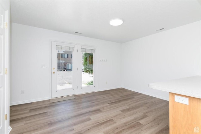 356 S 400 W, Logan, UT 84321 - unfurnished room featuring light wood finished floors and baseboards