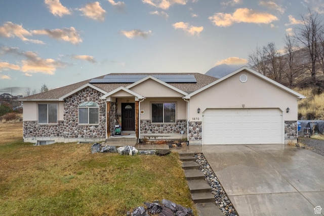 3870 W Mountaintop Cir, Cedar Hills, UT 84062 - single story home with stone siding, an attached garage, driveway, stucco siding, and a front lawn
