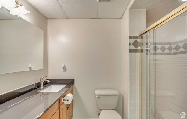 1231 E Tierney Cir, Sandy, UT 84094 - bathroom featuring toilet, vanity, a shower stall, and a drop ceiling