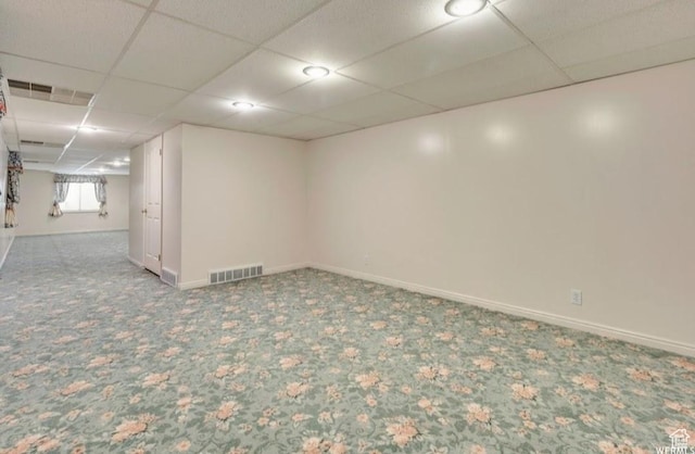 1231 E Tierney Cir, Sandy, UT 84094 - basement featuring a drop ceiling, carpet, and baseboards