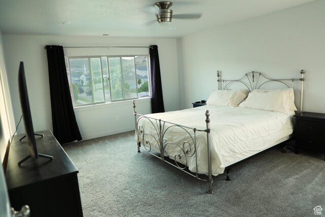 7315 N Stone Wall Cir, Eagle Mountain, UT 84005 - carpeted bedroom featuring a ceiling fan and baseboards