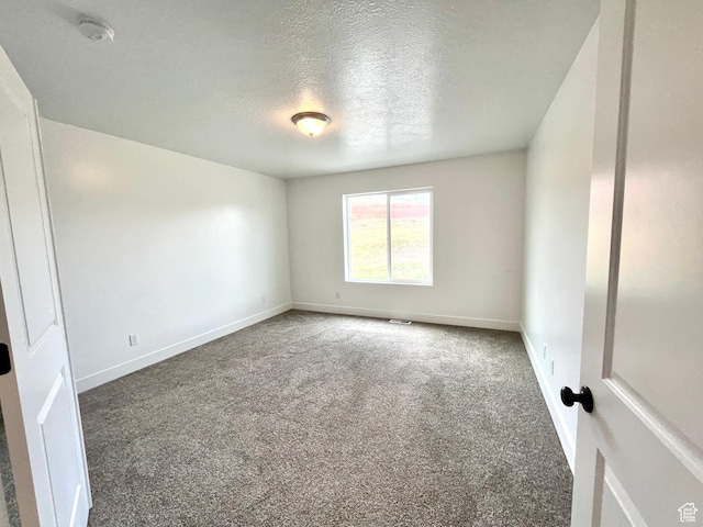 1937 S Freestone Blvd, Santaquin, UT 84655 - carpeted spare room with baseboards, a textured ceiling, and a smoke detector