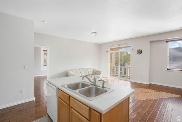 6882 W Bamburgh Way W, West Valley City, UT 84128 - kitchen featuring white dishwasher, open floor plan, a sink, wood finished floors, and baseboards
