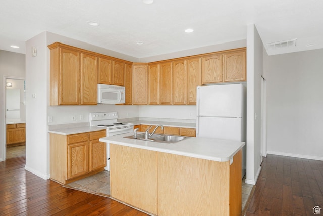 6882 W Bamburgh Way W, West Valley City, UT 84128 - kitchen with white appliances, a sink, dark wood-style flooring, light countertops, and an island with sink