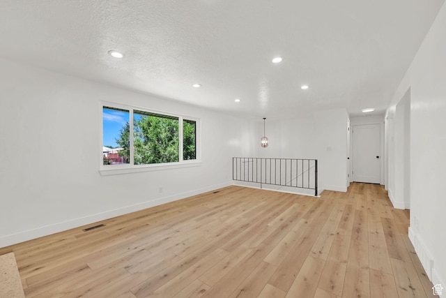 6034 S 2900 W, Roy, UT 84067 - unfurnished room with recessed lighting, light wood finished floors, and baseboards