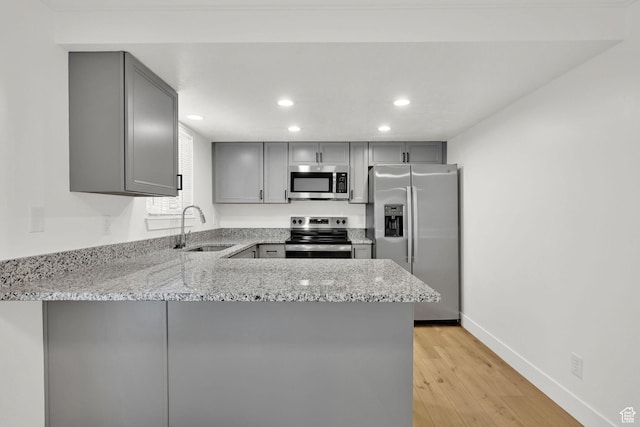 6034 S 2900 W, Roy, UT 84067 - kitchen with appliances with stainless steel finishes, gray cabinetry, a sink, and recessed lighting