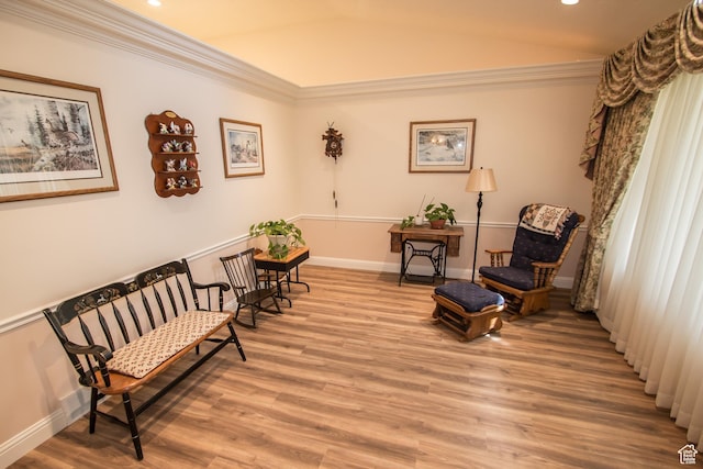 1655 E 3250 N, North Logan, UT 84341 - living area with light wood-style floors, ornamental molding, recessed lighting, and baseboards