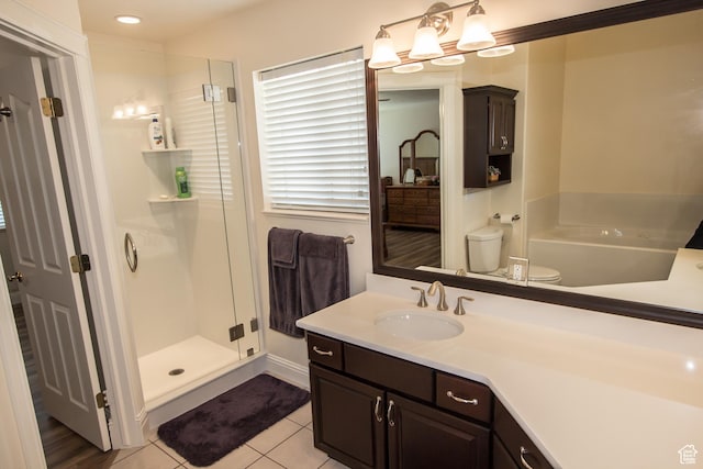 1655 E 3250 N, North Logan, UT 84341 - bathroom featuring a shower stall, vanity, tile patterned floors, and toilet