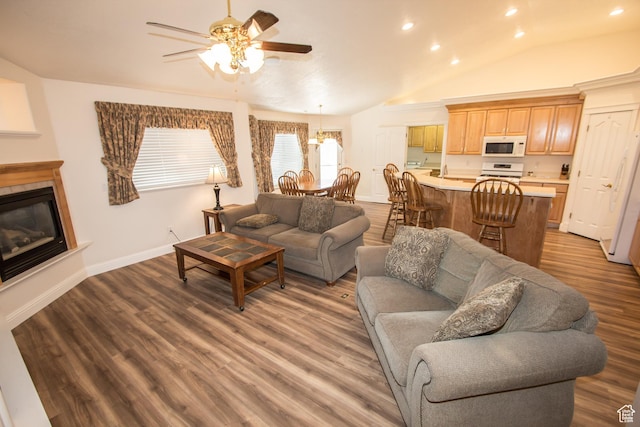 1655 E 3250 N, North Logan, UT 84341 - living area featuring ceiling fan, recessed lighting, wood finished floors, a glass covered fireplace, and vaulted ceiling