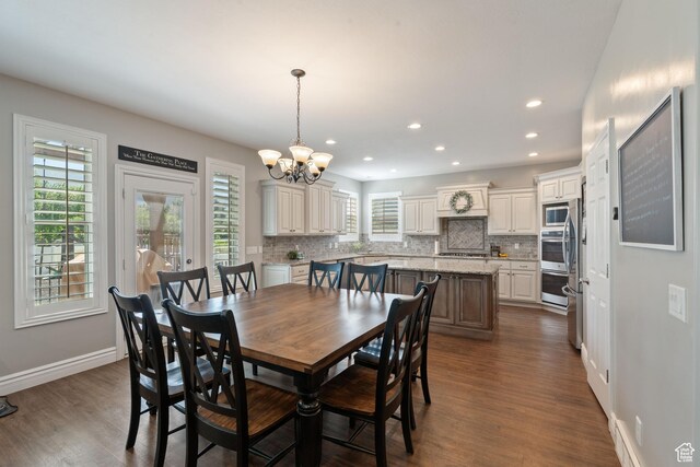 117 S 200 E, Kaysville, UT 84037 - dining room with a chandelier, dark wood finished floors, recessed lighting, and baseboards