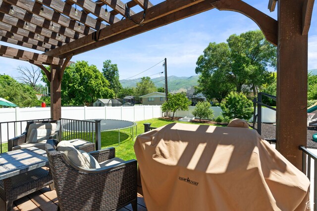 117 S 200 E, Kaysville, UT 84037 - view of patio with a pergola, outdoor dining space, and a mountain view