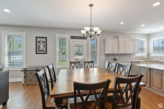 117 S 200 E, Kaysville, UT 84037 - dining room with a chandelier, recessed lighting, light wood finished floors, and baseboards