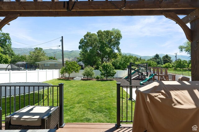 117 S 200 E, Kaysville, UT 84037 - view of yard featuring a mountain view and a playground