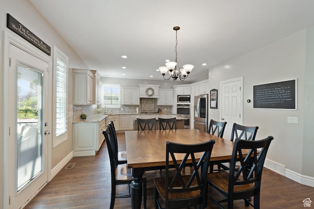 117 S 200 E, Kaysville, UT 84037 - dining space featuring a chandelier, dark wood-style flooring, recessed lighting, and baseboards