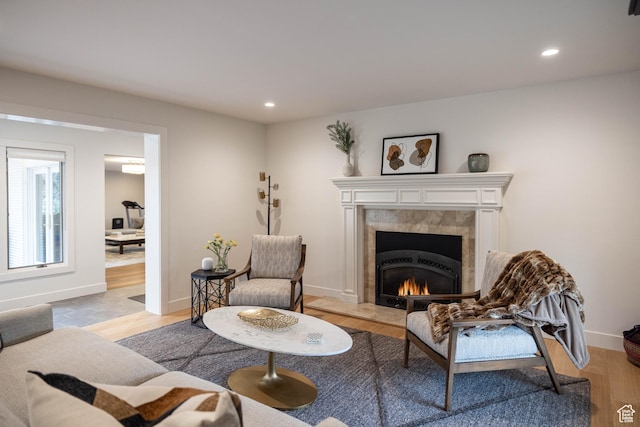 3563 S Canyon Way, Millcreek, UT 84106 - living room with a high end fireplace, recessed lighting, and light wood-type flooring
