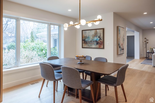 3563 S Canyon Way, Millcreek, UT 84106 - dining space featuring light wood-style floors, recessed lighting, and a chandelier