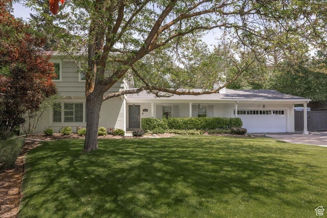 3563 S Canyon Way, Millcreek, UT 84106 - view of front of home featuring an attached garage, a front yard, and driveway