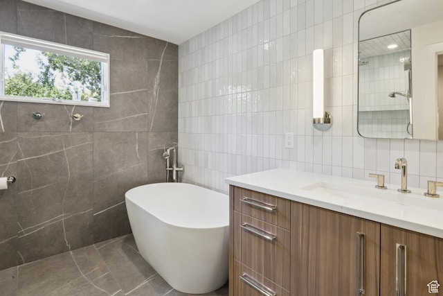 3563 S Canyon Way, Millcreek, UT 84106 - full bath with tile walls, vanity, a soaking tub, and tile patterned flooring
