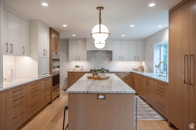 3563 S Canyon Way, Millcreek, UT 84106 - kitchen with a center island, modern cabinets, backsplash, and recessed lighting