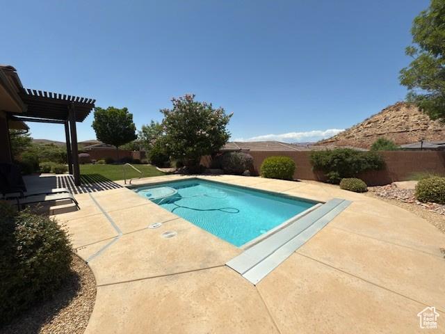 1523 E Talus Way, St George, UT 84790 - view of pool with a patio, a fenced backyard, and a pergola