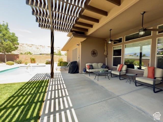 1523 E Talus Way, St George, UT 84790 - fenced backyard with an outdoor hangout area, a ceiling fan, a patio, and a pergola