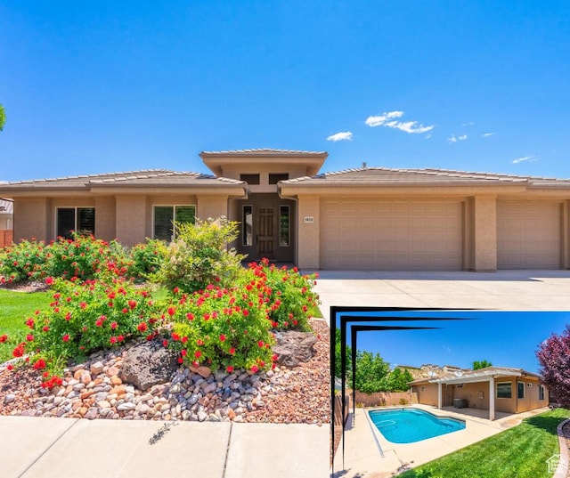1432 E 2420th Cir S, St George, UT 84790 - prairie-style home featuring an attached garage, concrete driveway, and stucco siding