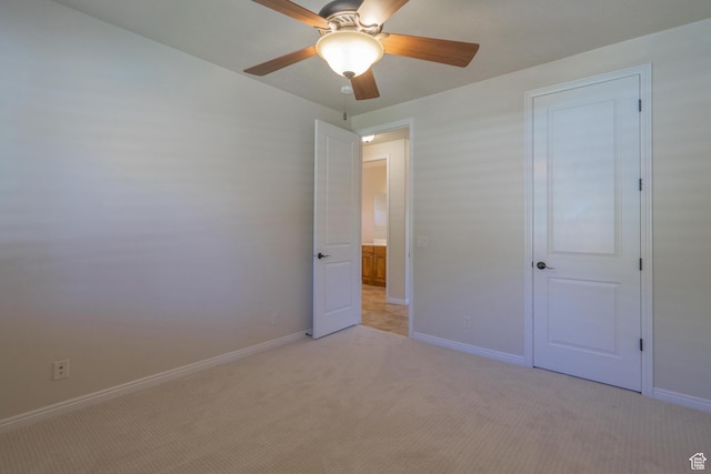 1432 E 2420th Cir S, St George, UT 84790 - unfurnished bedroom with light colored carpet, baseboards, and a ceiling fan