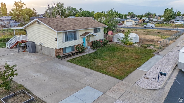 1878 S 3300 W, Syracuse, UT 84075 - view of side of property featuring a residential view, brick siding, and roof with shingles