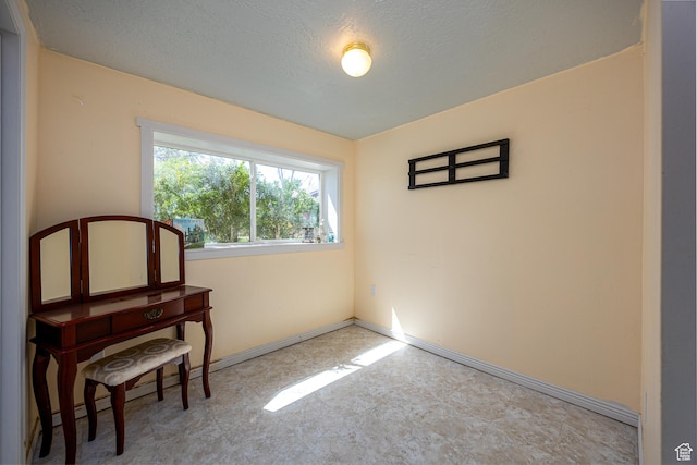 1878 S 3300 W, Syracuse, UT 84075 - unfurnished room with baseboards, tile patterned floors, and a textured ceiling