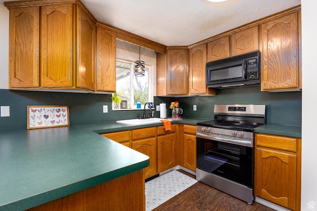 1878 S 3300 W, Syracuse, UT 84075 - kitchen with electric stove, black microwave, a sink, brown cabinetry, and a textured ceiling