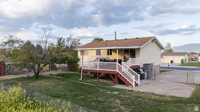 1878 S 3300 W, Syracuse, UT 84075 - back of house with a deck with mountain view and stairs