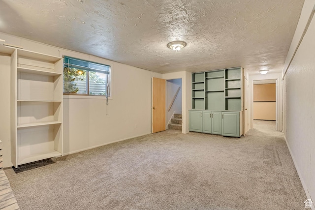 1236 E Violet Dr, Sandy, UT 84094 - unfurnished bedroom featuring light carpet, a textured ceiling, and baseboards