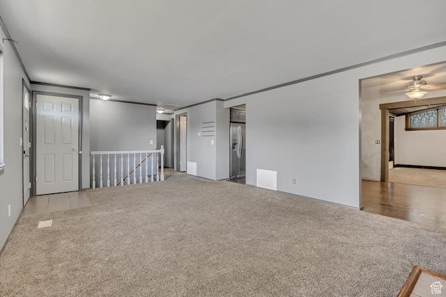 1236 E Violet Dr, Sandy, UT 84094 - unfurnished room featuring carpet, ornamental molding, and a ceiling fan
