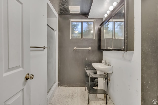 1236 E Violet Dr, Sandy, UT 84094 - bathroom with a stall shower and speckle patterned floor