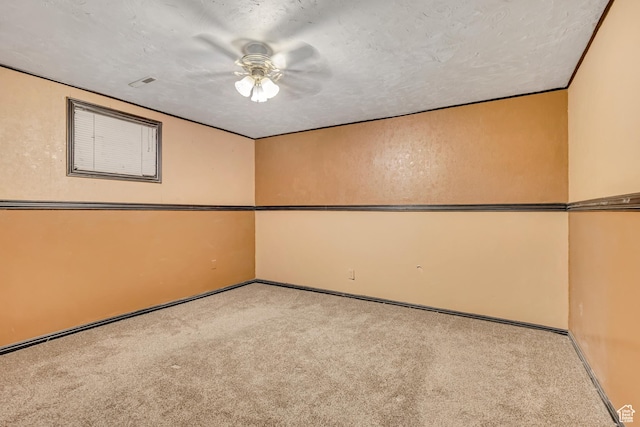 1236 E Violet Dr, Sandy, UT 84094 - empty room with carpet floors, ceiling fan, baseboards, and a textured ceiling
