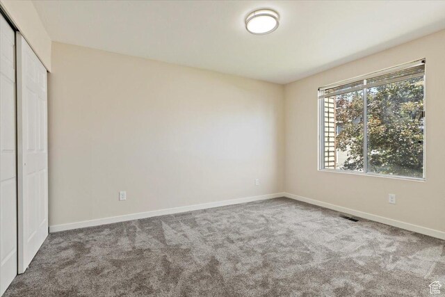 1622 W 8740 S, West Jordan, UT 84088 - unfurnished bedroom featuring carpet, baseboards, and a closet