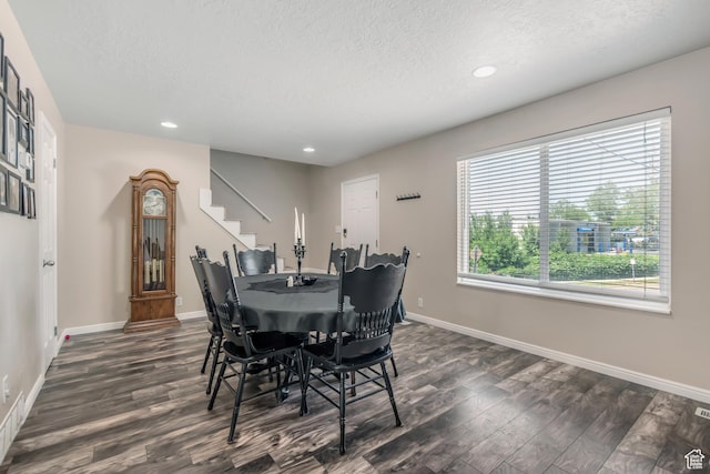 2316 E Claybourne Ave S, Millcreek, UT 84109 - dining space featuring dark wood-type flooring, a textured ceiling, recessed lighting, baseboards, and stairs