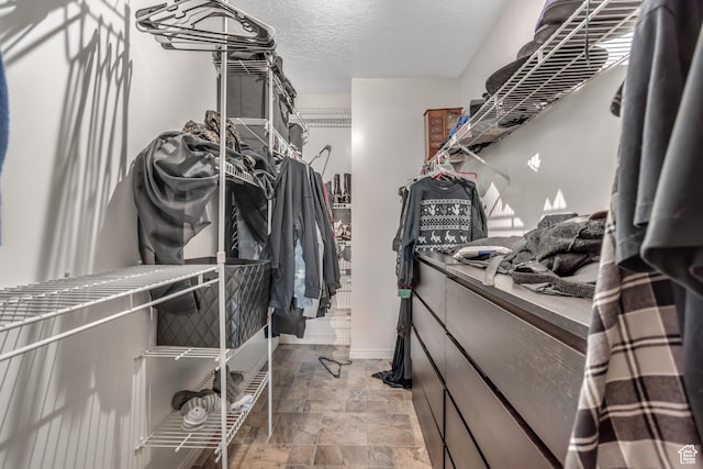 2316 E Claybourne Ave S, Millcreek, UT 84109 - spacious closet featuring light stone finish floors