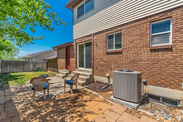 2316 E Claybourne Ave S, Millcreek, UT 84109 - view of patio / terrace with entry steps and central AC unit