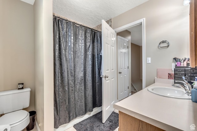 2316 E Claybourne Ave S, Millcreek, UT 84109 - bathroom featuring vanity, toilet, a shower with shower curtain, and a textured ceiling