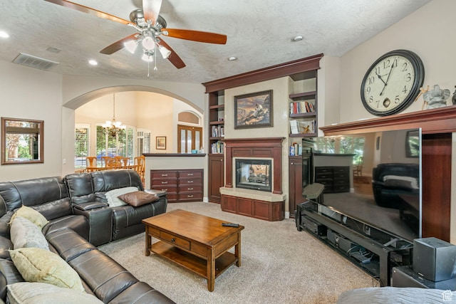 1287 W Bloomington Dr S Unit 7, Bloomington, UT 84790 - living area featuring arched walkways, light carpet, ceiling fan, a textured ceiling, and recessed lighting