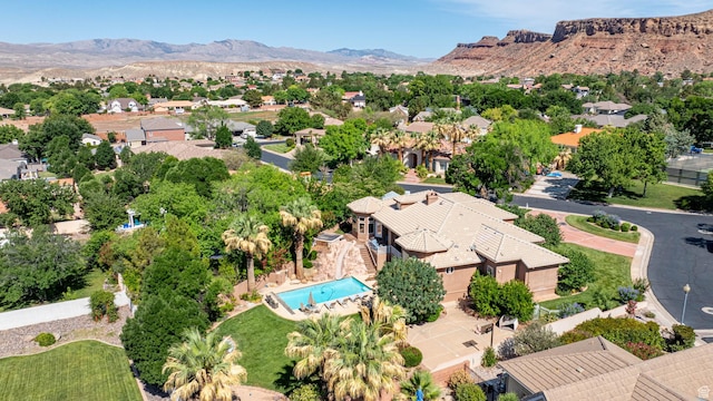 1287 W Bloomington Dr S Unit 7, Bloomington, UT 84790 - aerial perspective of suburban area featuring mountains and a pool area