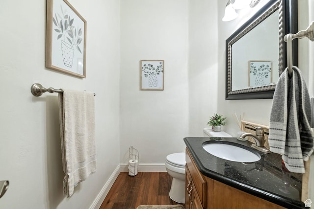 1287 W Bloomington Dr S Unit 7, Bloomington, UT 84790 - bathroom featuring wood finished floors and vanity